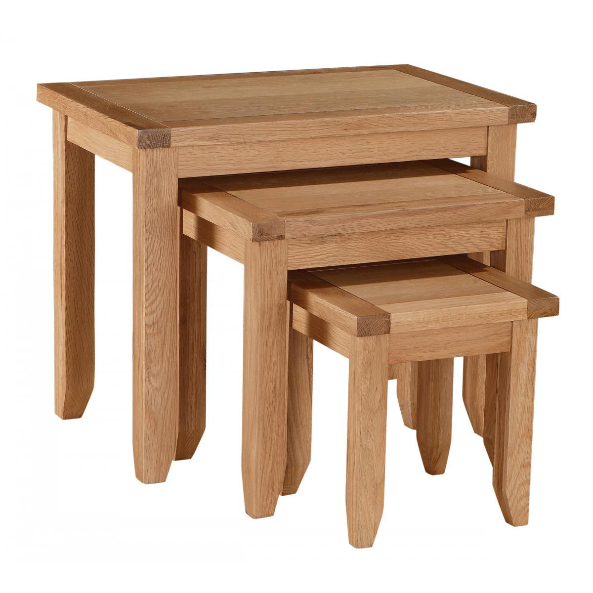 Nest of three solid oak tables with a natural oak finish, stacked in order of size.