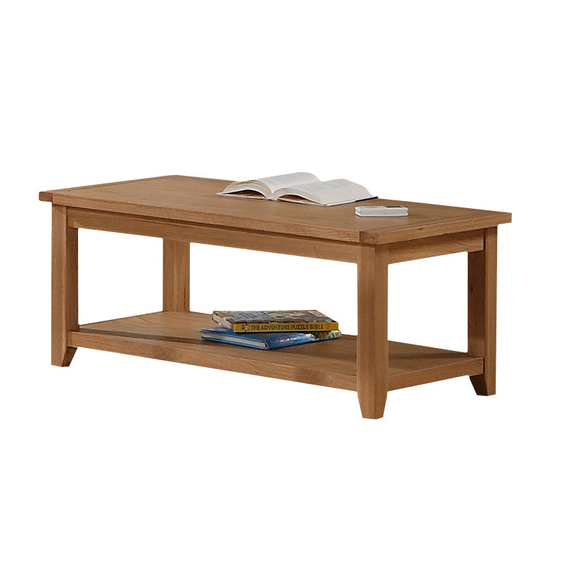 Wooden coffee table with books on a white background