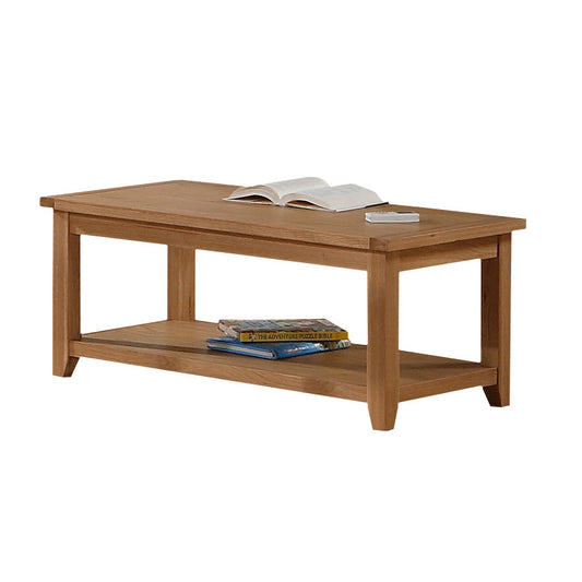 Wooden coffee table with books on a white background