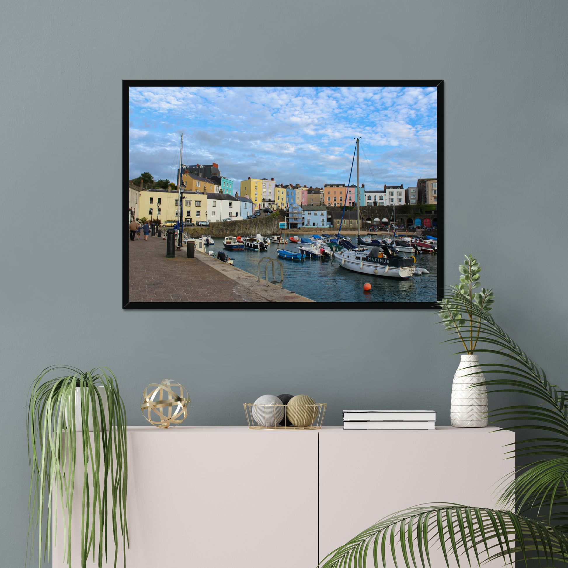 Framed photo of a harbour scene with colourful buildings and boats under a blue sky