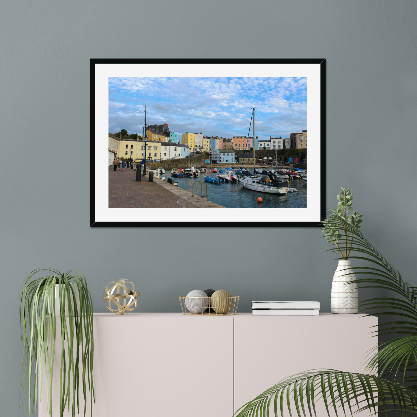 Framed photo of a harbour scene with colourful buildings and boats under a blue sky