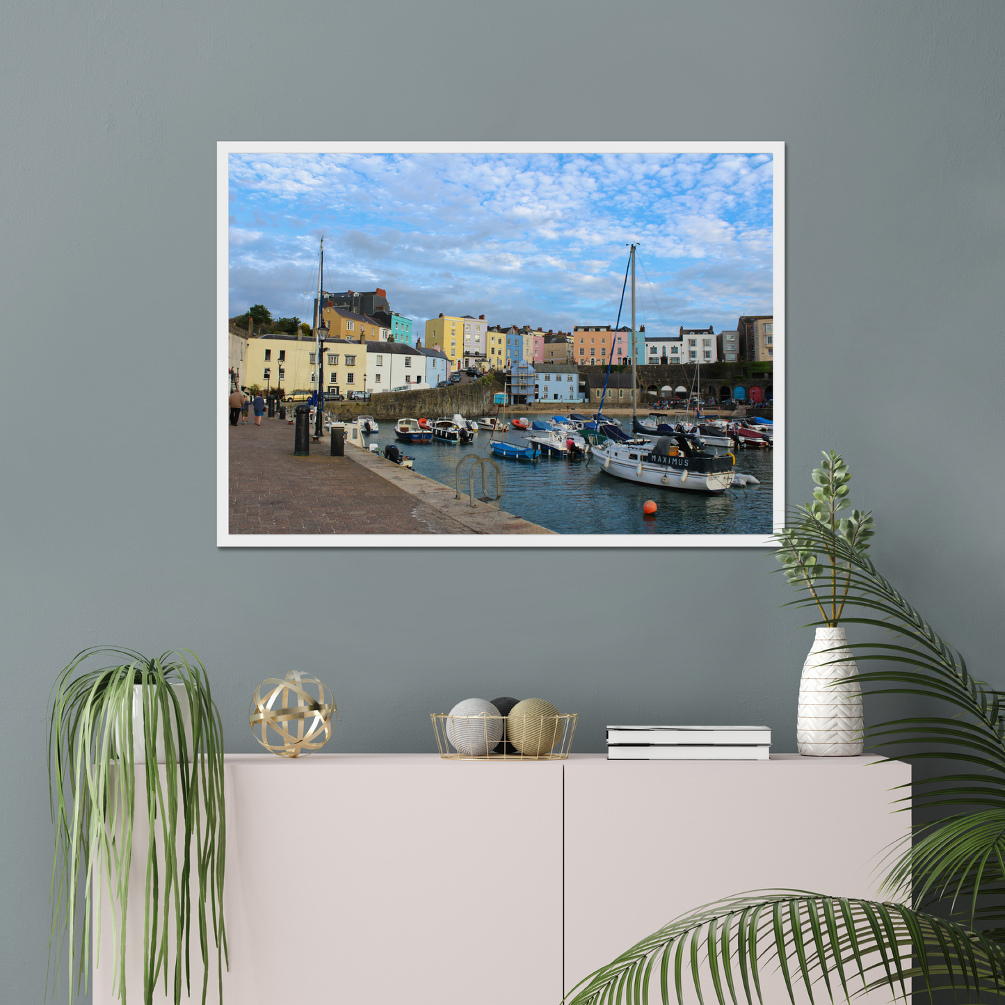 Framed photo of a harbour scene with colourful buildings and boats under a blue sky