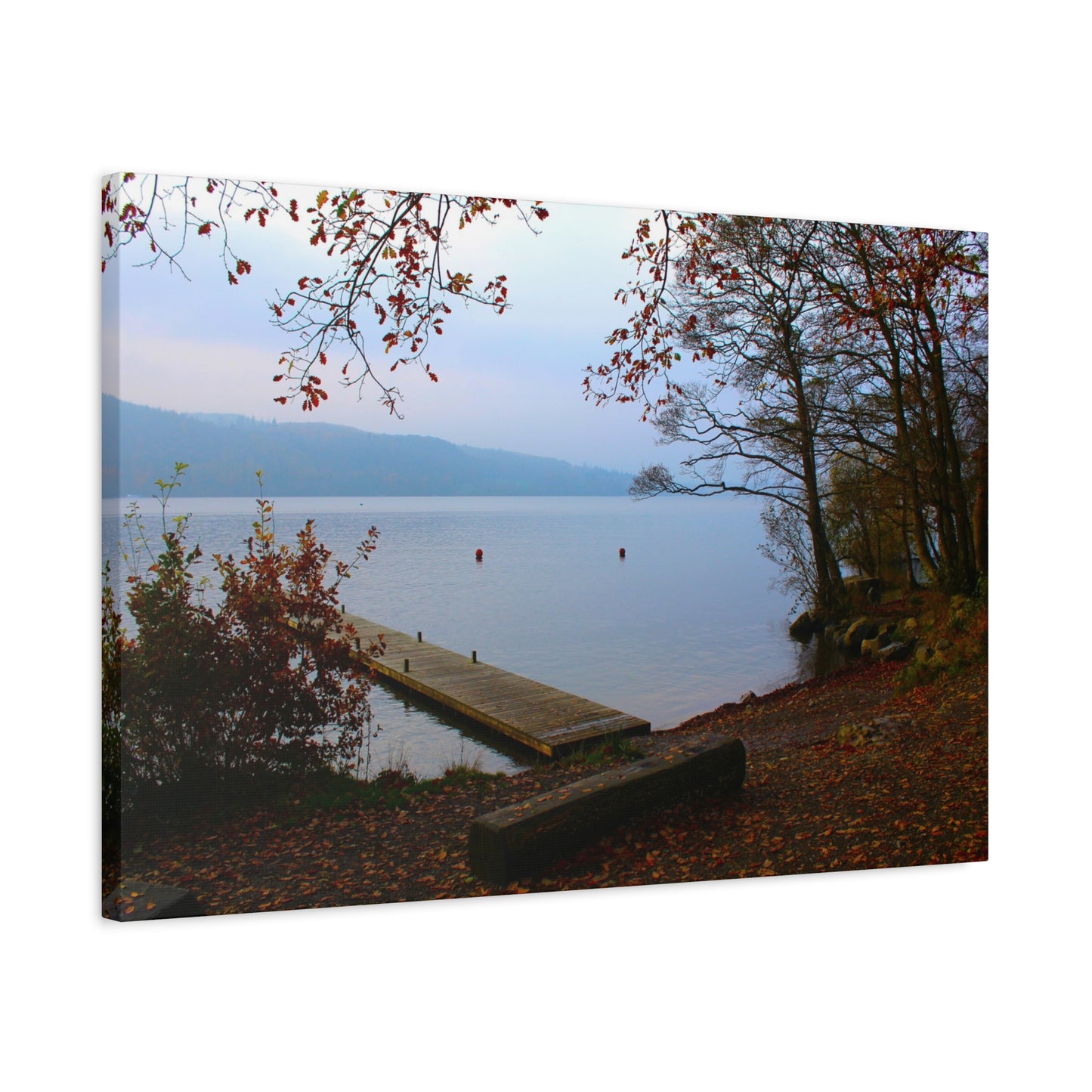 Canvas print of a lake scene with a wooden dock and autumn foliage.