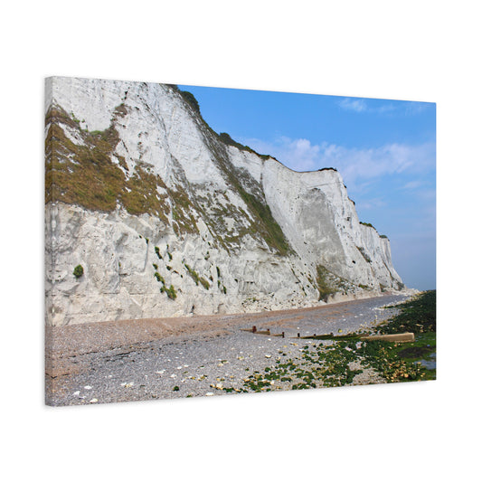 White cliffs with a beach and blue sky