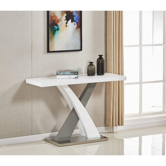 A white and grey high gloss console table with a geometric X-shaped base and a rectangular tabletop, placed in a room near a window with curtains.